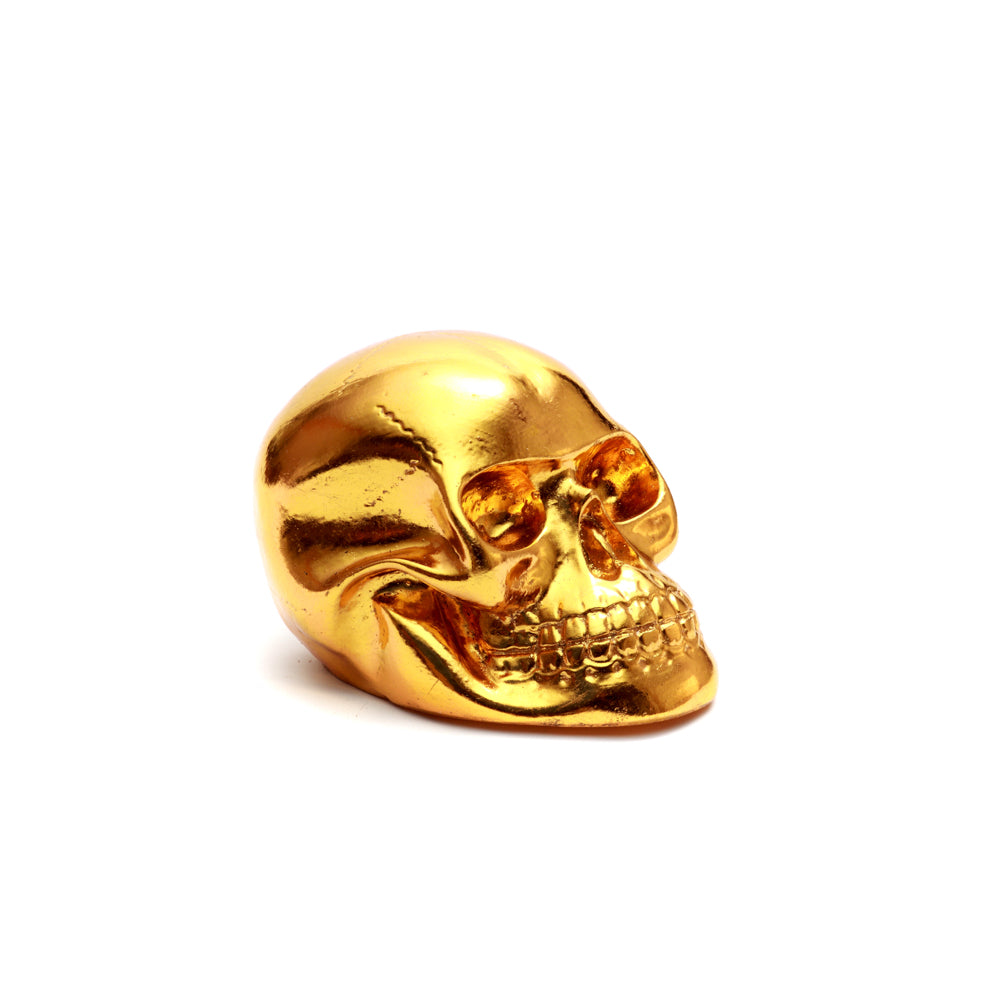 La Cabeza de Calavera de Resina Dorada S