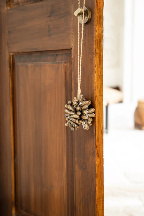 Brown cowrie shell tassel